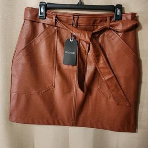 NWT- STELLA LUCE boutique purchased Faux leather mini